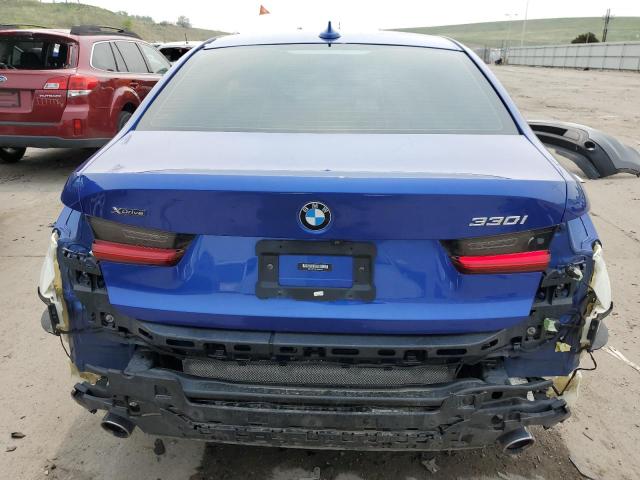 WBA5R7C51KAJ85083 - 2019 BMW 330XI Blau Foto 6