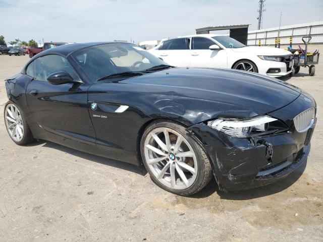 WBALM7C54BE383686 - 2011 BMW Z4 SDRIVE35I შავი ფოტო 4
