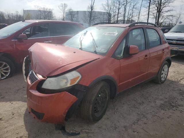 JS2YA5A35A6300076 - 2010 SUZUKI SX4 ORANGE photo 1