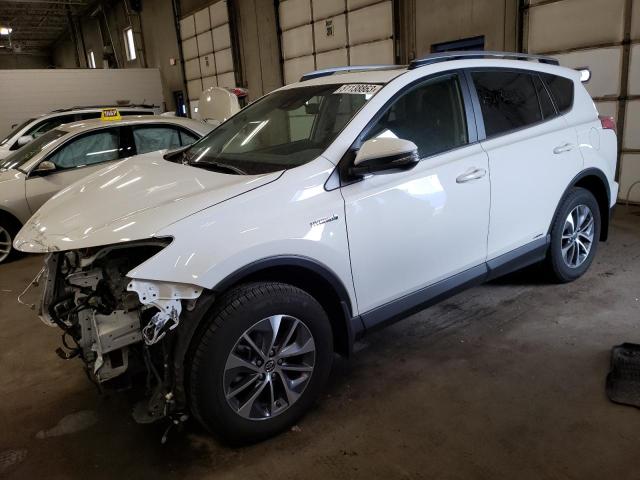 JTMRJREV1JD170116 - 2018 TOYOTA RAV4 HV LE WHITE photo 1