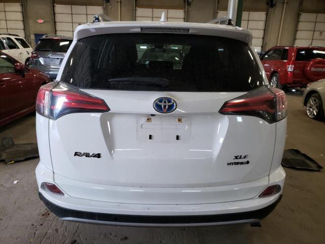 JTMRJREV1JD170116 - 2018 TOYOTA RAV4 HV LE WHITE photo 6