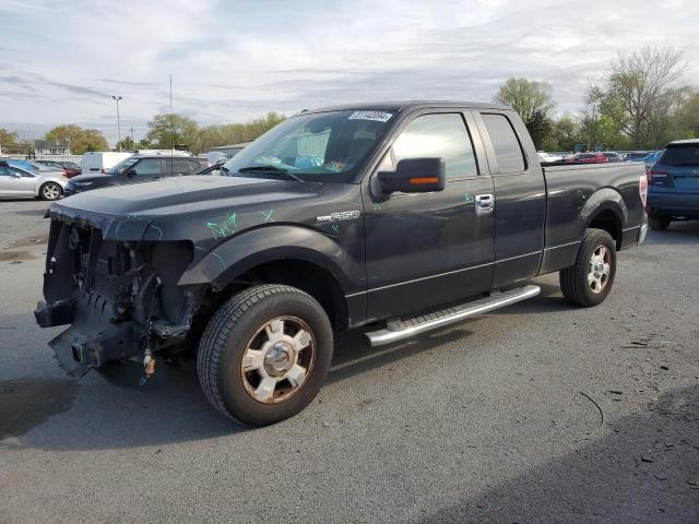 1FTEX1CM2BKD25570 - 2011 FORD F150 SUPER CAB BLACK photo 1