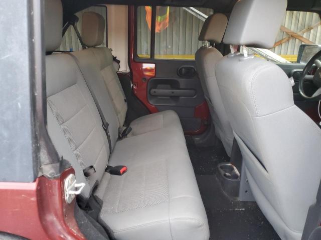 1J4GA59189L773664 - 2009 JEEP WRANGLER U SAHARA ბურგუნდია ფოტო 10