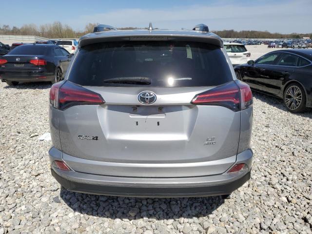 JTMBFREV6JD246979 - 2018 TOYOTA RAV4 LE SILVER photo 6