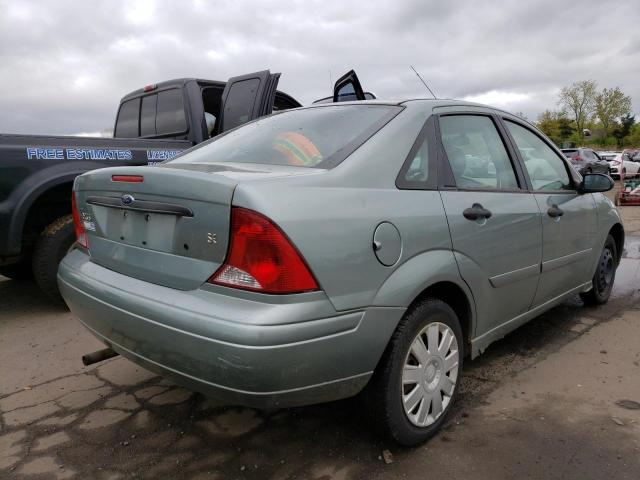 1FAHP34Z94W142400 - 2004 FORD FOCUS SE COMFORT GREEN photo 3