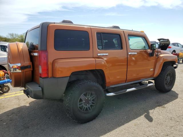 5GTDN13E178246625 - 2007 HUMMER H3 ORANGE photo 3