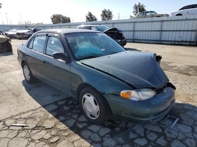1Y1SK5488YZ412430 - 2000 CHEVROLET GEO PRIZM BASE GREEN photo 4