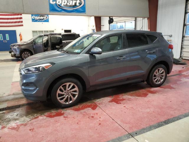 KM8J2CA43JU681553 - 2018 HYUNDAI TUCSON SE GRAY photo 1