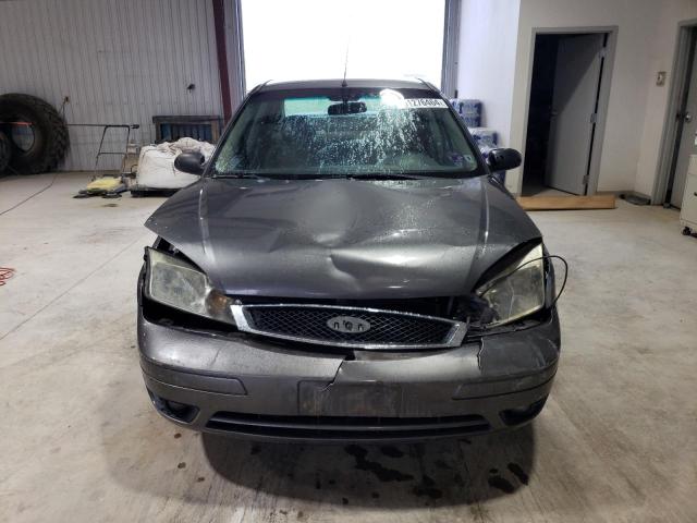 1FAHP34N77W355475 - 2007 FORD FOCUS ZX4 GRAY photo 5