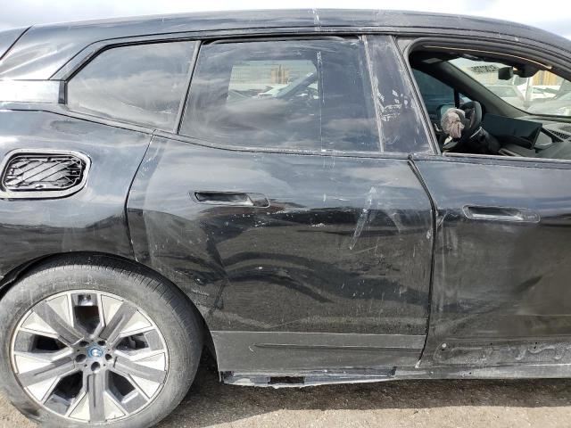 WB523CF00SCT18853 - 2025 BMW IX XDRIVE50 BLACK photo 11