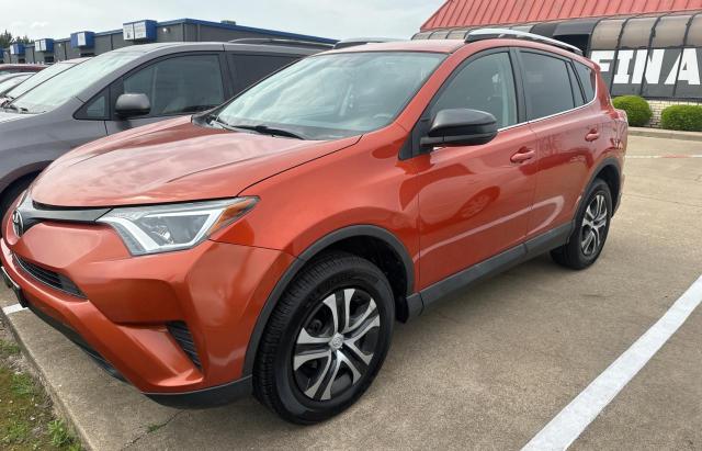 2T3ZFREV8GW289388 - 2016 TOYOTA RAV4 LE ORANGE photo 2