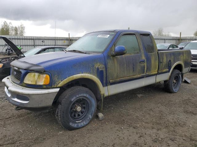 1FTRX18L9WKA40775 - 1998 FORD F150 BLUE photo 1