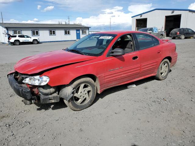 1G2NE52T1XC572963 - 1999 PONTIAC GRAND AM SE RED photo 1