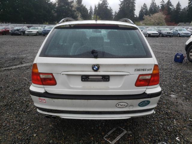 WBAEP33453PF01771 - 2003 BMW 325 XIT WHITE photo 6