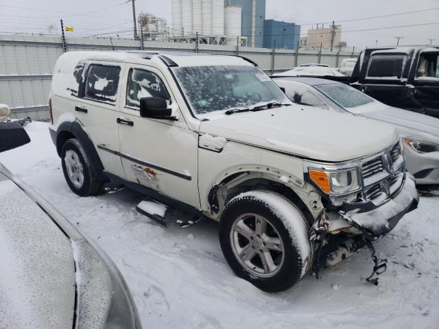 1D8GU28KX7W601574 - 2007 DODGE NITRO SXT WHITE photo 4