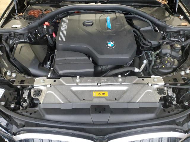 3MW39FS08P8C88897 - 2023 BMW 330XE BLACK photo 11