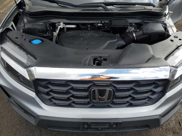 5FNYF8H57PB001772 - 2023 HONDA PASSPORT EXL SILVER photo 12