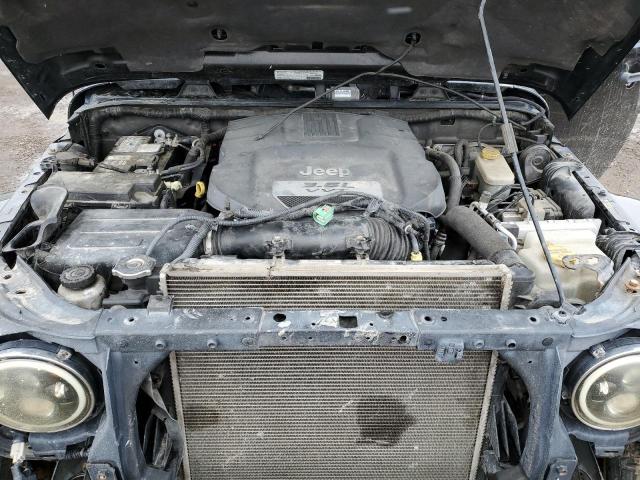 1C4BJWEG2DL691373 - 2013 JEEP WRANGLER U SAHARA BLACK photo 11