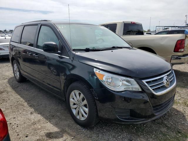 2C4RVABG2DR725569 - 2013 VOLKSWAGEN ROUTAN SE BLACK photo 4