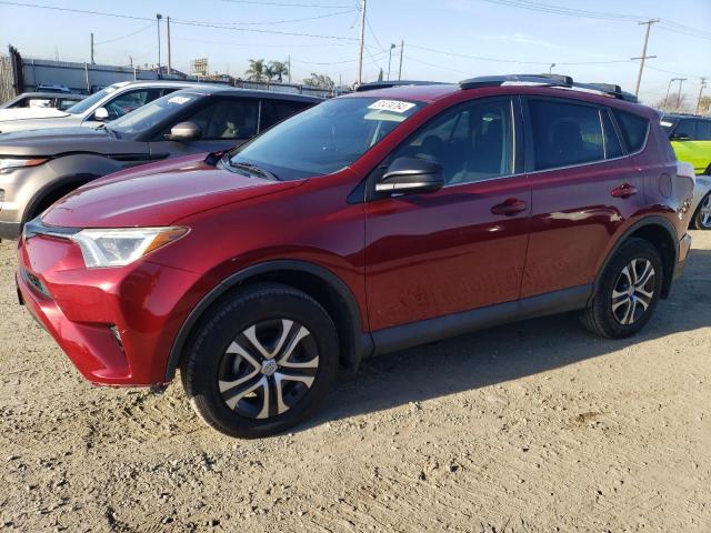 2T3ZFREV8JW460311 - 2018 TOYOTA RAV4 LE RED photo 1