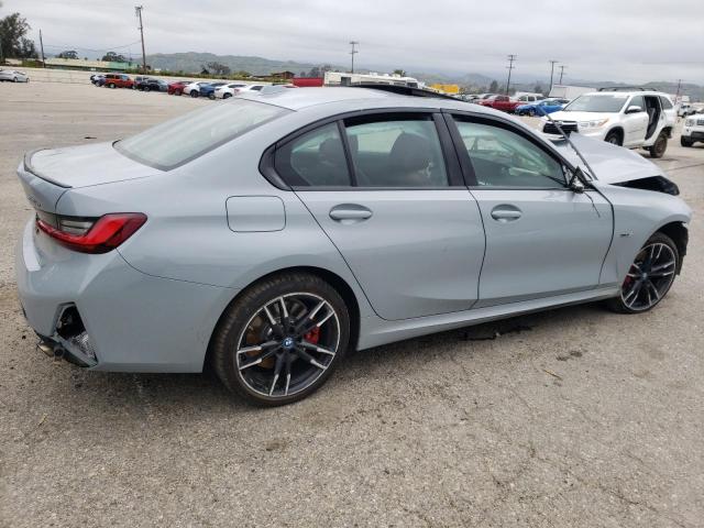 3MW39FF09P8D19598 - 2023 BMW 330E GRAY photo 3