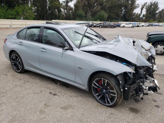 3MW39FF09P8D19598 - 2023 BMW 330E GRAY photo 4