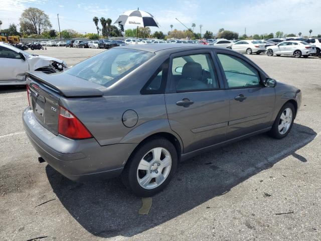 1FAHP34NX6W113231 - 2006 FORD FOCUS ZX4 GRAY photo 3