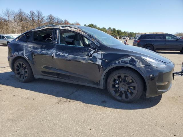 7SAYGDEE2PA034995 - 2023 TESLA MODEL Y BLACK photo 4