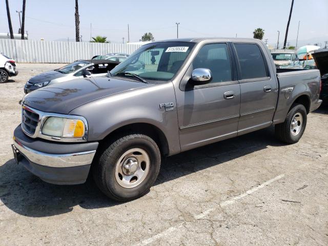 1FTRW07L82KB61581 - 2002 FORD F150 SUPERCREW GRAY photo 1