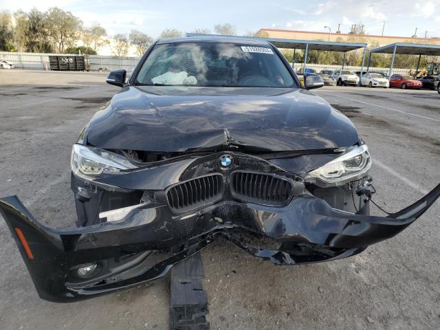 WBA8A9C57JAH13565 - 2018 BMW 320 I BLACK photo 5