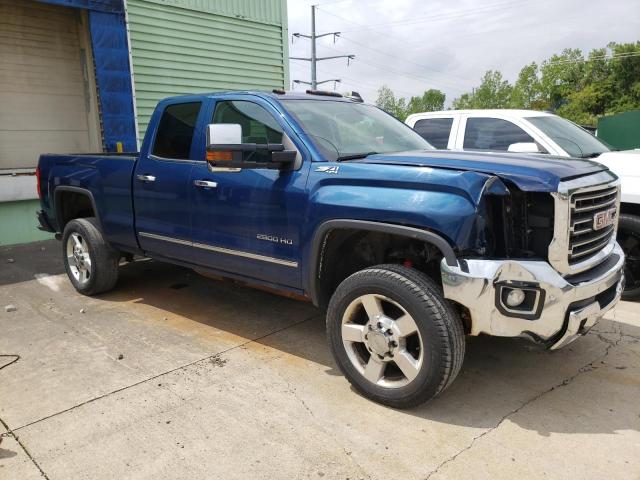 1GT22TEG3GZ394335 - 2016 GMC SIERRA K2500 SLT BLUE photo 4