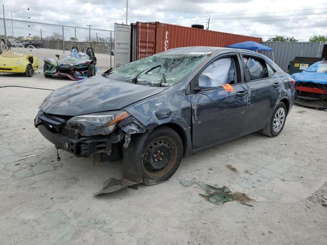 5YFBURHE9KP919151 - 2019 TOYOTA COROLLA L رمادي صورة 1