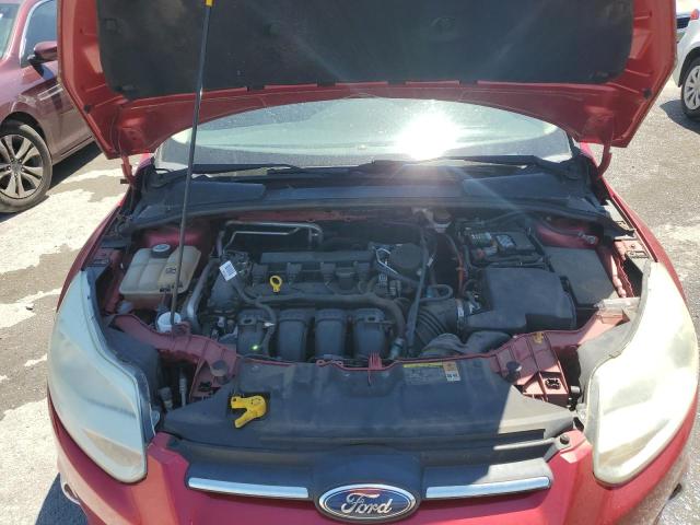 1FAHP3F20CL287583 - 2012 FORD FOCUS SE RED photo 11