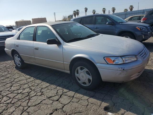 4T1BF22KXVU911305 - 1997 TOYOTA CAMRY CE GOLD photo 4