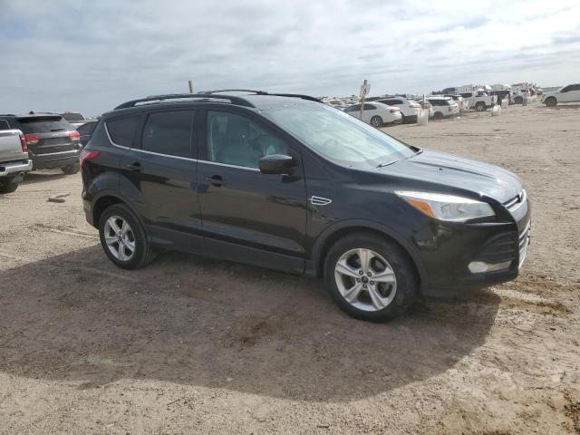 1FMCU0GX4EUA40291 - 2014 FORD ESCAPE SE BLACK photo 4