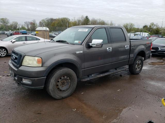 1FTPW14524KA76001 - 2004 FORD F150 SUPERCREW GRAY photo 1