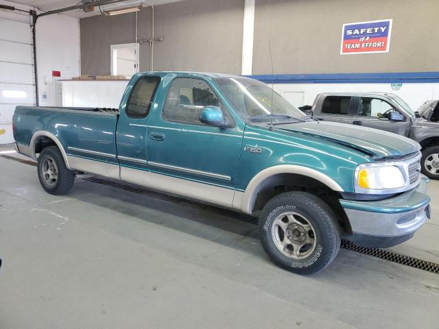 1FTDX18W6VKB95450 - 1997 FORD F150 GREEN photo 4