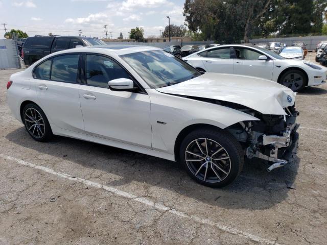 WBA5P7C04NFL77163 - 2022 BMW 330E WHITE photo 4