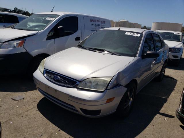 1FAFP34NX7W312319 - 2007 FORD FOCUS ZX4 SILVER photo 1