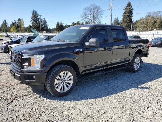 1FTEW1EP8JKC10528 - 2018 FORD F150 SUPERCREW BLACK photo 1