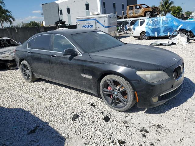 WBAKC8C55CC435022 - 2012 BMW 750 LXI შავი ფოტო 4