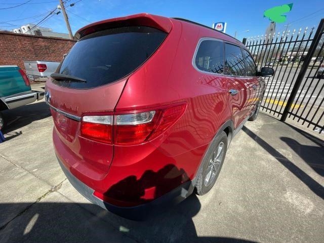 KM8SM4HF3GU155170 - 2016 HYUNDAI SANTA FE SE RED photo 4