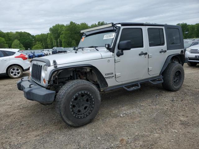 1J4BA3H17AL217561 - 2010 JEEP WRANGLER U SPORT SILVER photo 1