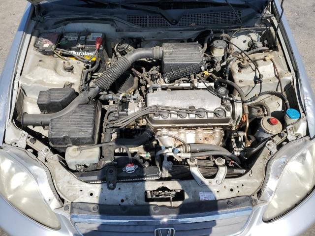 2HGEJ6618XH579154 - 1999 HONDA CIVIC BASE SILVER photo 11