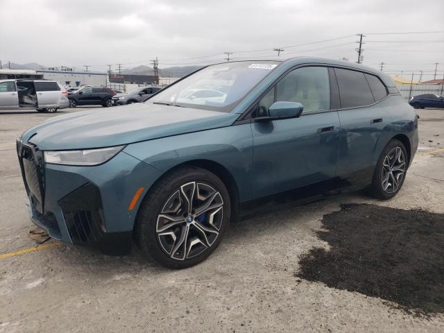 WB523CF07RCR72663 - 2024 BMW IX XDRIVE50 TEAL photo 1