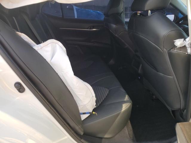 4T1G11AKXRU213539 - 2024 TOYOTA CAMRY SE NIGHT SHADE WHITE photo 10