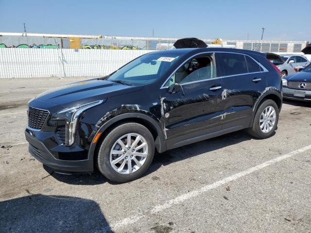 1GYAZAR44NF136961 - 2022 CADILLAC XT4 LUXURY BLACK photo 1