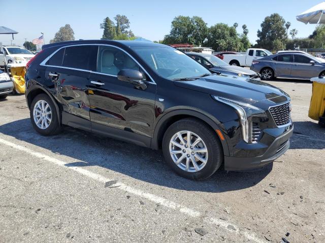 1GYAZAR44NF136961 - 2022 CADILLAC XT4 LUXURY BLACK photo 4