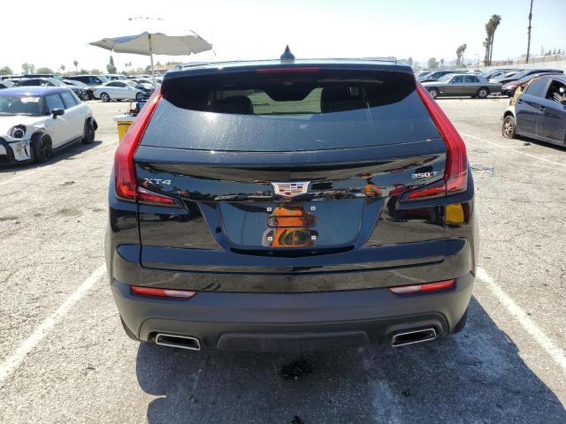 1GYAZAR44NF136961 - 2022 CADILLAC XT4 LUXURY BLACK photo 6