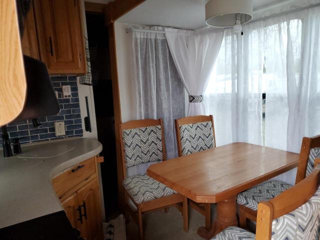 4YDF368265D511414 - 2005 KEYSTONE MONTANA WHITE photo 5